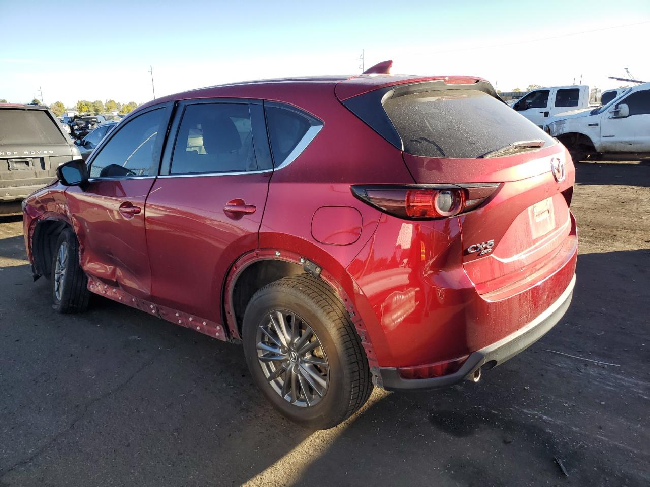 2021 Mazda CX-5 VIN JM3KFBCM3M0370471 Copart auction photo, side / hail damage thumbnail 2