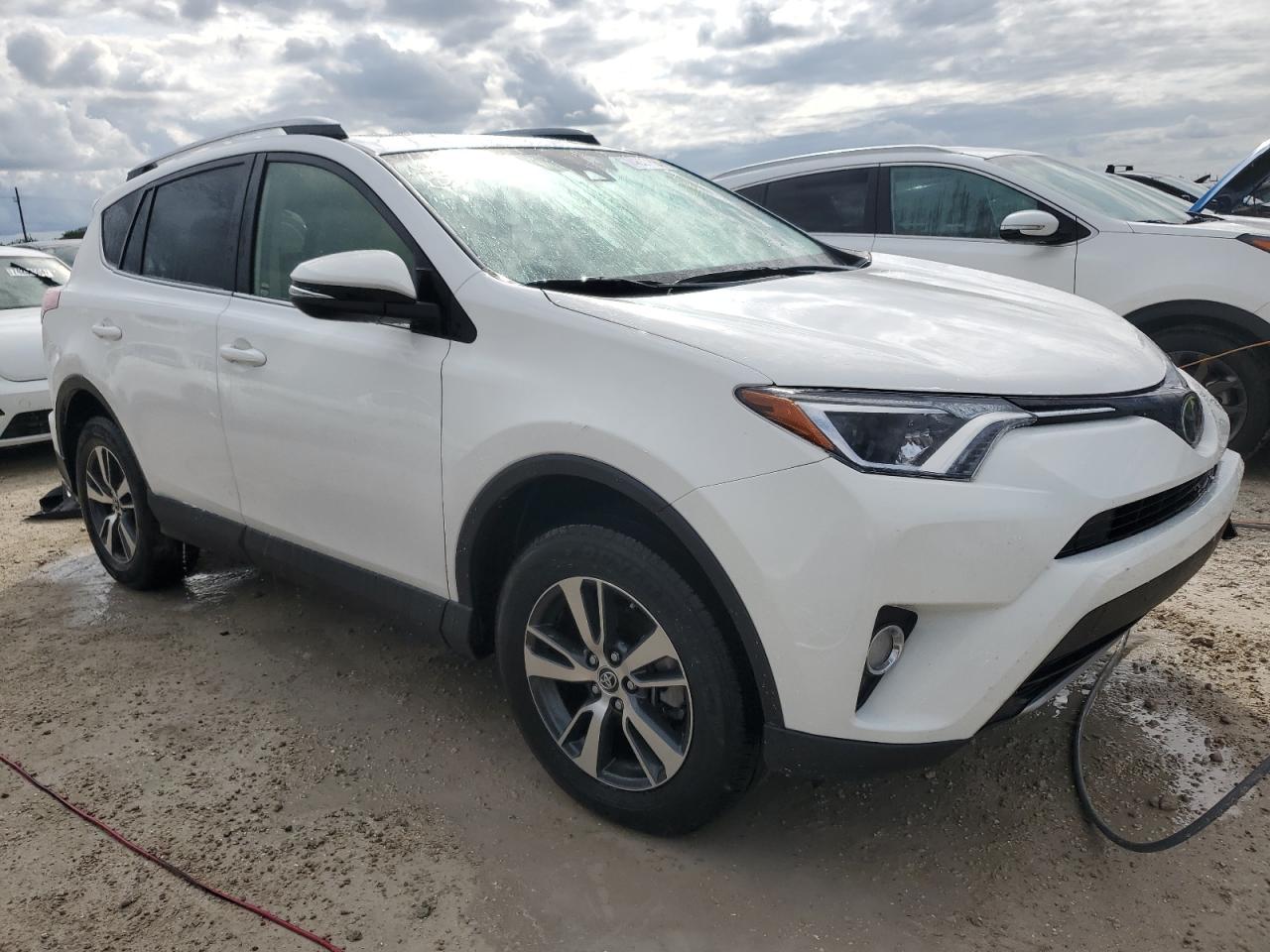 2018 Toyota RAV 4 VIN JTMWFREV9JJ165252 Copart auction photo, water/flood damage thumbnail 4