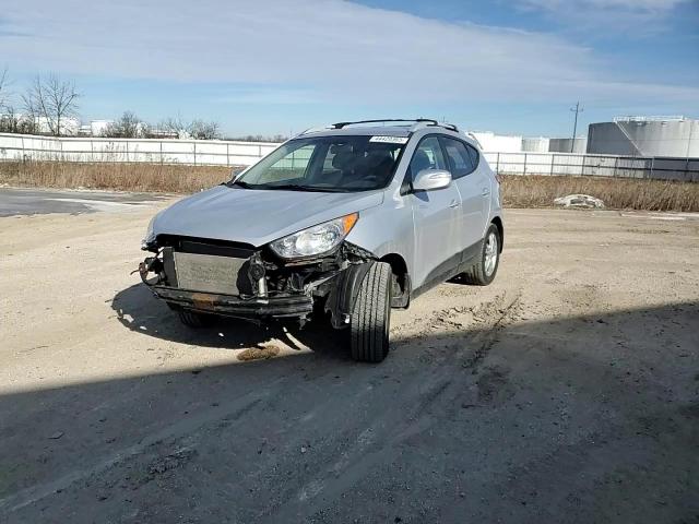 2012 Hyundai Tucson VIN KM8JUCAC6CU477561 Copart auction photo, front end / rear end damage thumbnail 11