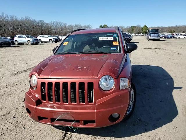 2010 Jeep Compass VIN 1J4NT4FB2AD506947 Copart auction photo, front end / minor dent/scratches damage thumbnail 12