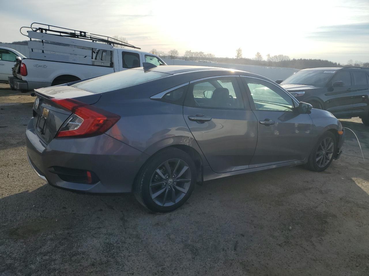 2021 Honda Civic VIN 19XFC1F34ME007877 Copart auction photo, front end / minor dent/scratches damage thumbnail 3