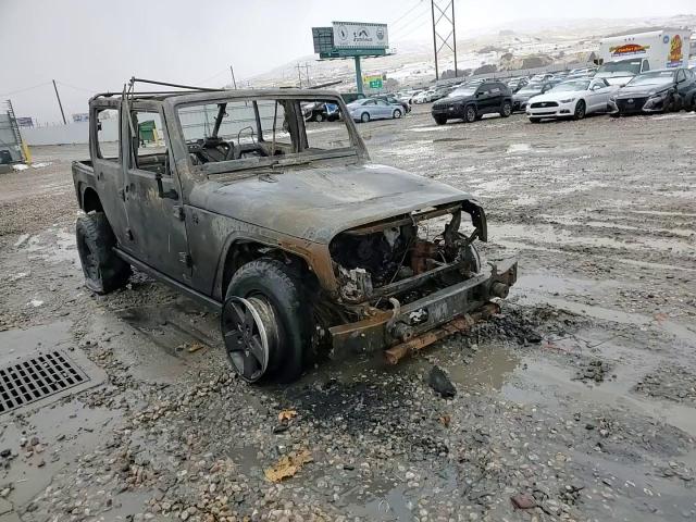 2010 Jeep Wrangler VIN 1J4BA6H12AL116672 Copart auction photo, burn damage thumbnail 11
