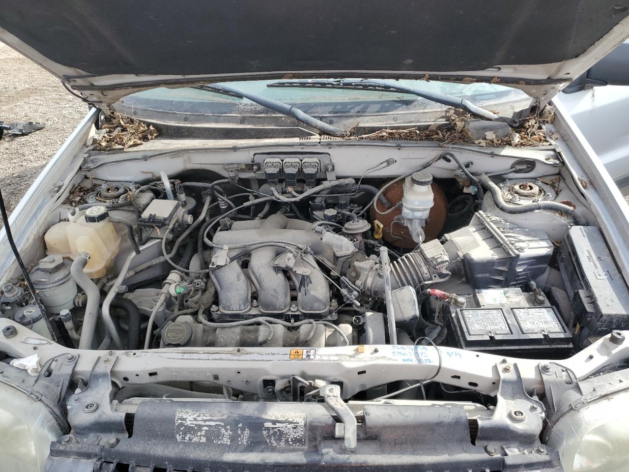 2005 Ford Escape VIN 1FMYU93125KA35243 Copart auction photo, side / rear end damage thumbnail 12