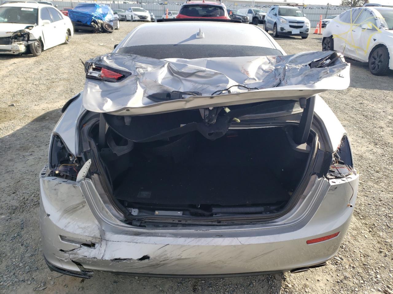 2014 Maserati Ghibli VIN ZAM57XSA3E1105712 Copart auction photo, rear end damage thumbnail 6