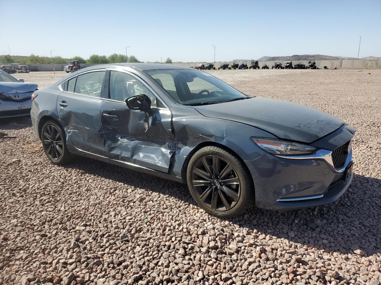 2021 Mazda 6 VIN JM1GL1WY4M1614090 Copart auction photo, all over damage thumbnail 4
