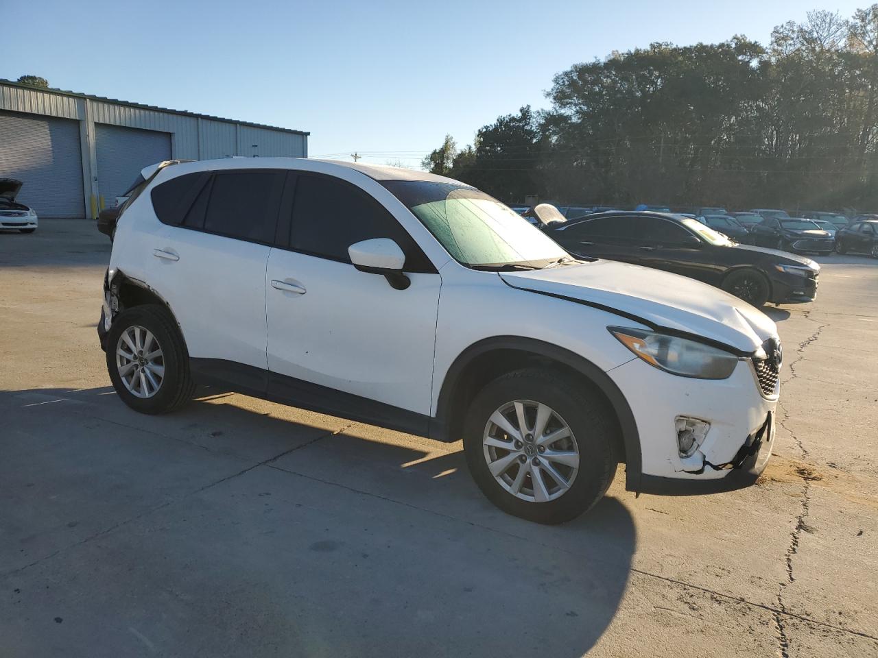 2014 Mazda CX-5 VIN JM3KE2CY6E0310529 Copart auction photo, all over / rear end damage thumbnail 4