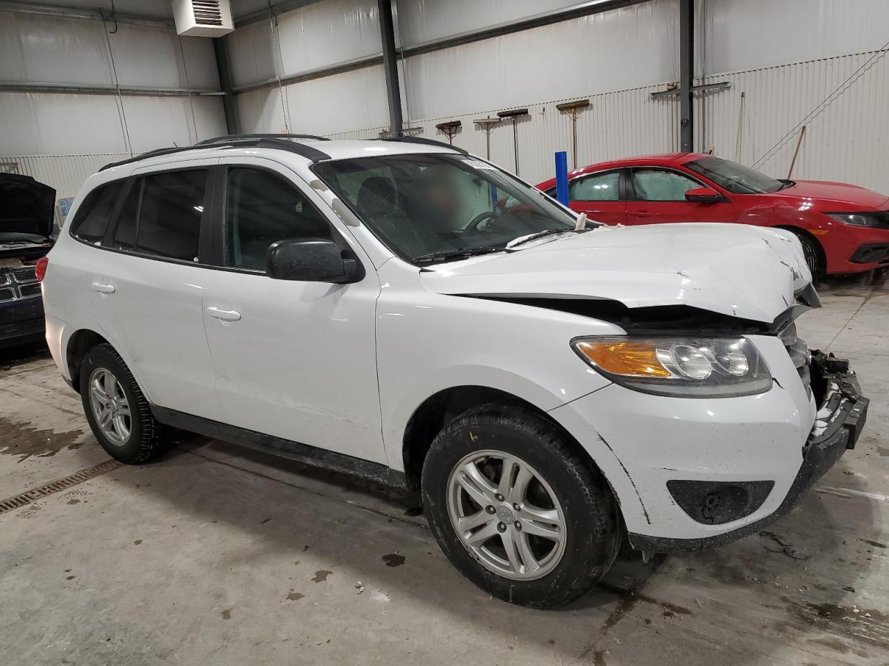 2012 Hyundai Santa Fe VIN 5XYZGDAB3CG141332 Copart auction photo, front end damage thumbnail 4