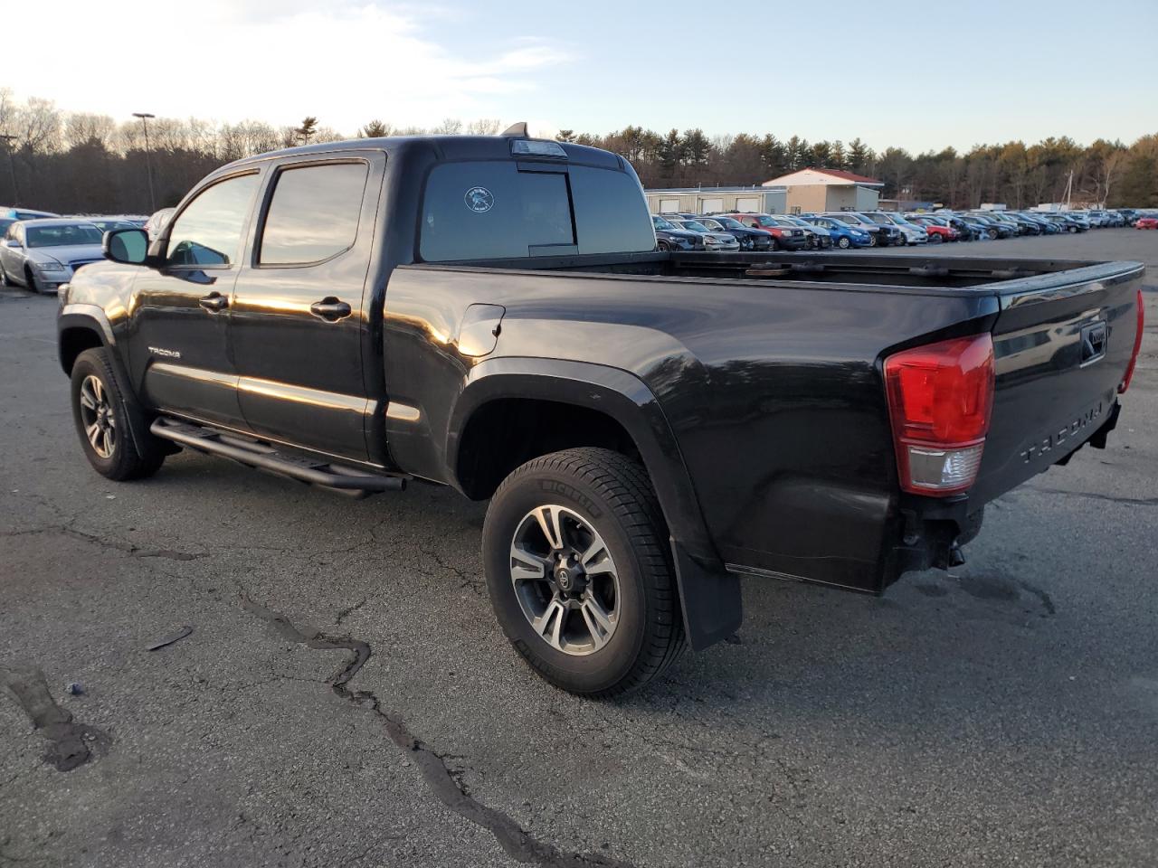 2017 Toyota Tacoma VIN 3TMDZ5BN0HM031299 Copart auction photo, rear end damage thumbnail 2