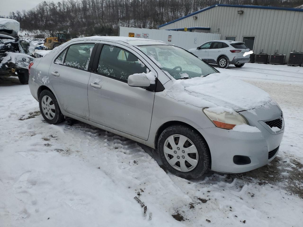 2011 Toyota Yaris VIN JTDBT4K37B1401590 Copart auction photo, rear end damage thumbnail 4