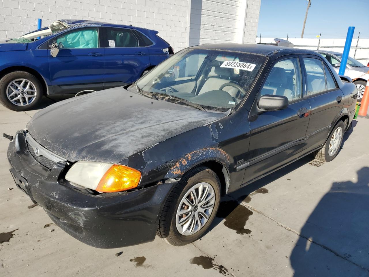 2000 Mazda Protege VIN JM1BJ2220Y0239835