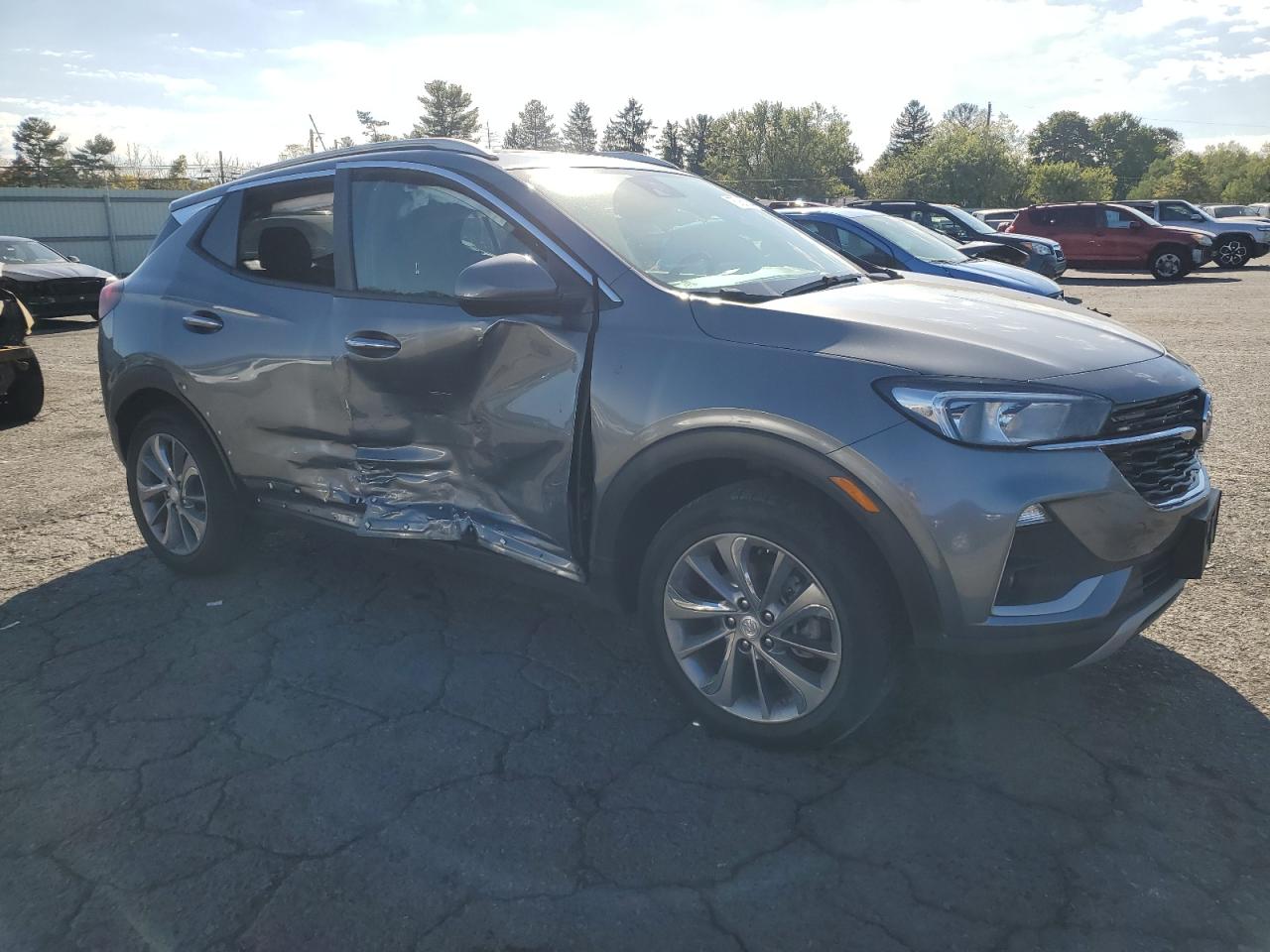 2020 Buick Encore VIN KL4MMESLXLB099410 Copart auction photo, side damage thumbnail 4