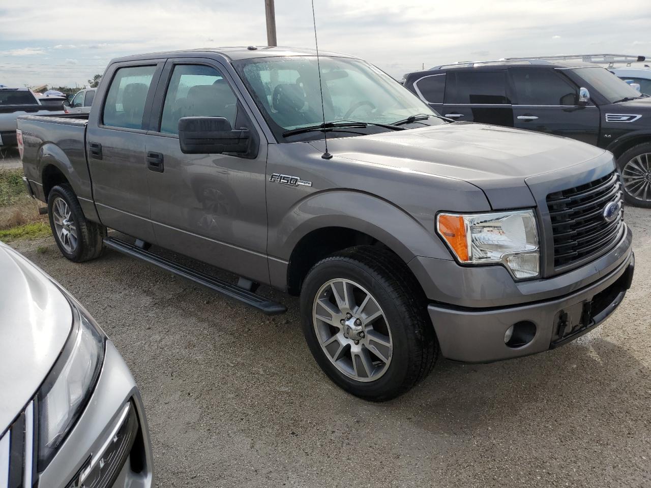 2014 Ford F-150 VIN 1FTFW1CF3EFA82387 Copart auction photo, water/flood damage thumbnail 4
