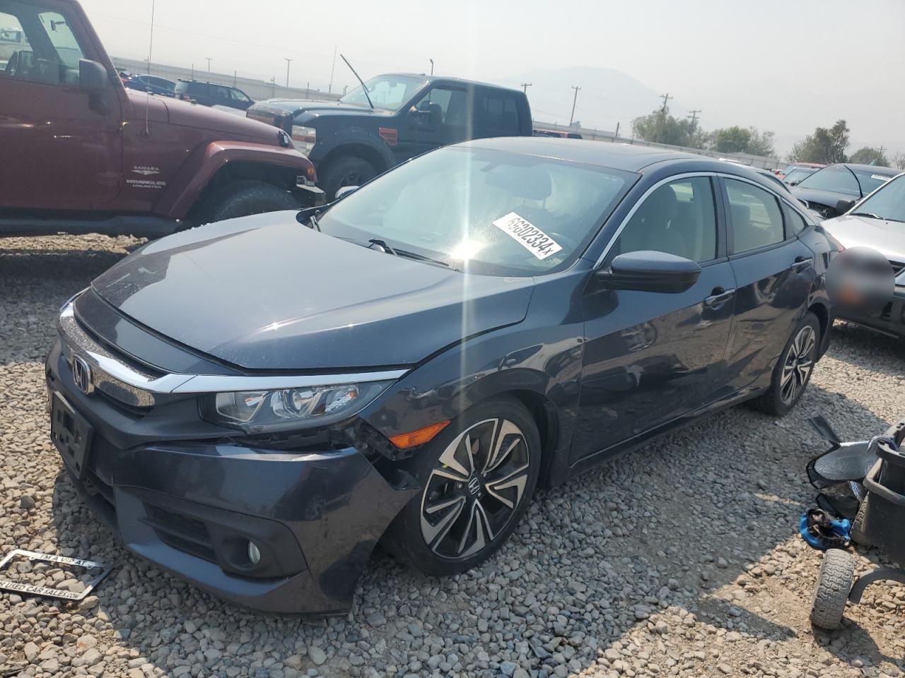 2018 Honda Civic VIN JHMFC1F3XJX021664