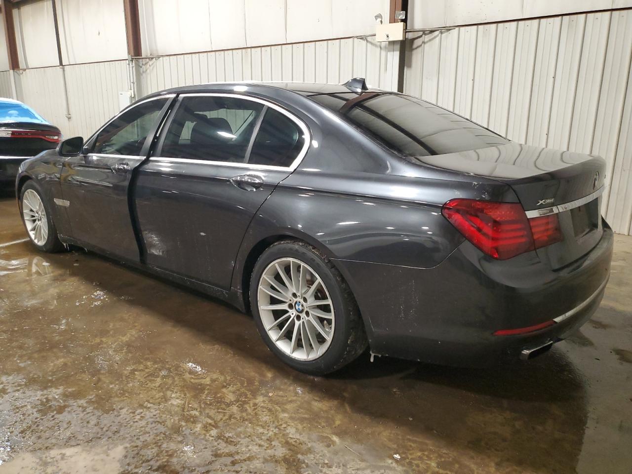 2013 BMW 7er VIN WBAYF8C54DD140880 Copart auction photo, side / front end damage thumbnail 2