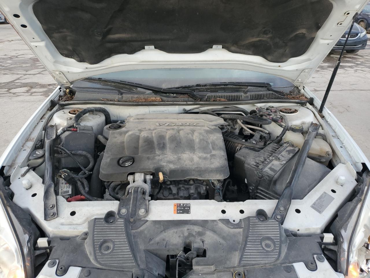 2014 Chevrolet Impala VIN 2G1WB5E3XE1132398 Copart auction photo, front end / side damage thumbnail 12