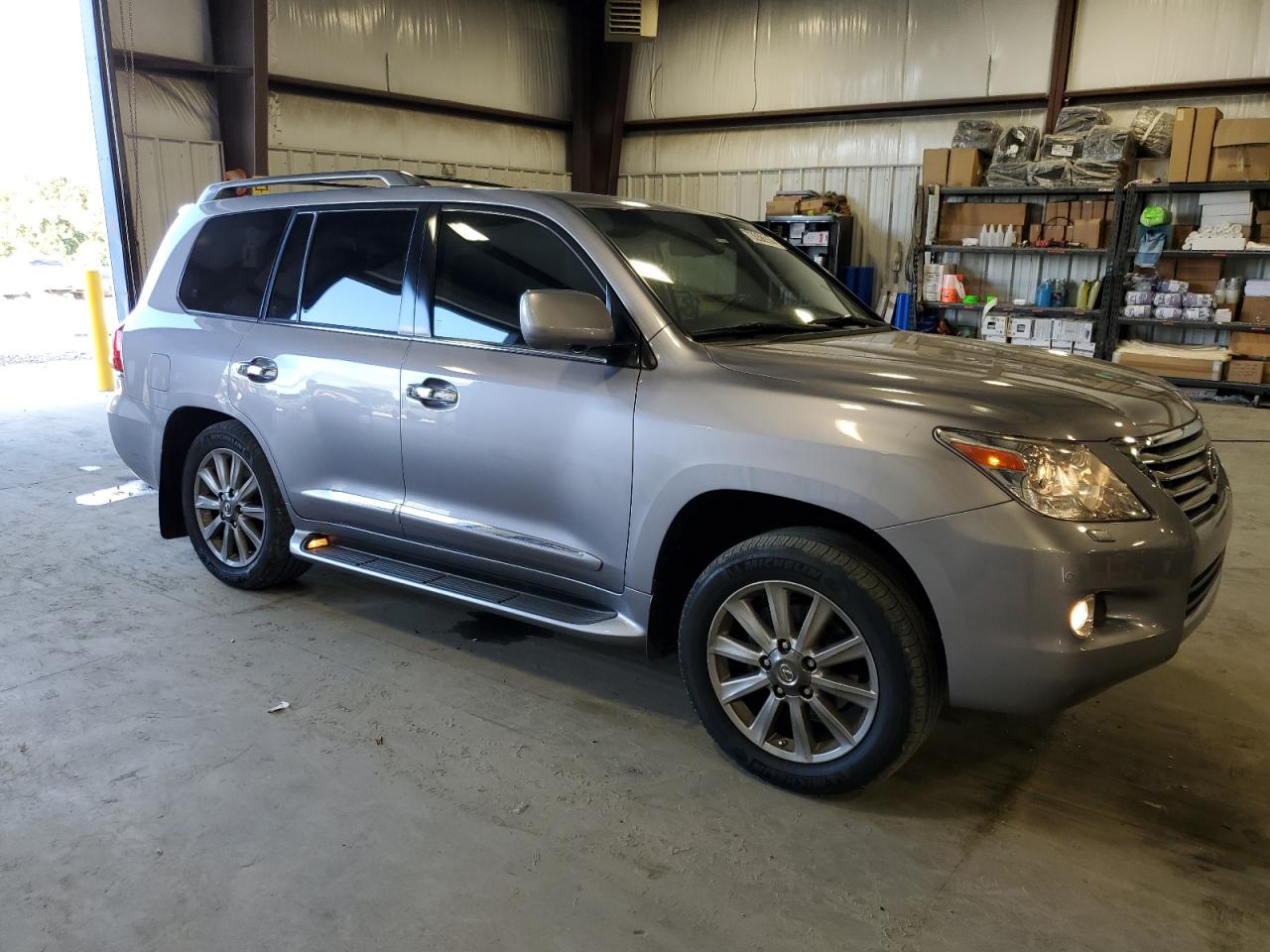 2011 Lexus LX VIN JTJHY7AX2B4071418 Copart auction photo, side / rear end damage thumbnail 4
