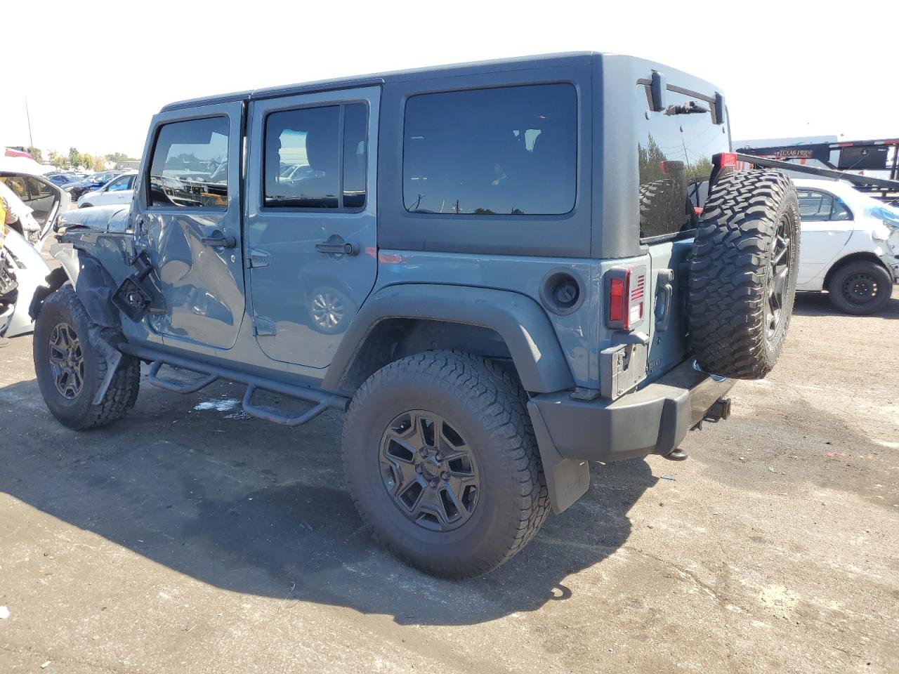 2014 Jeep Wrangler VIN 1C4BJWDG8EL257610 Copart auction photo, front end damage thumbnail 2