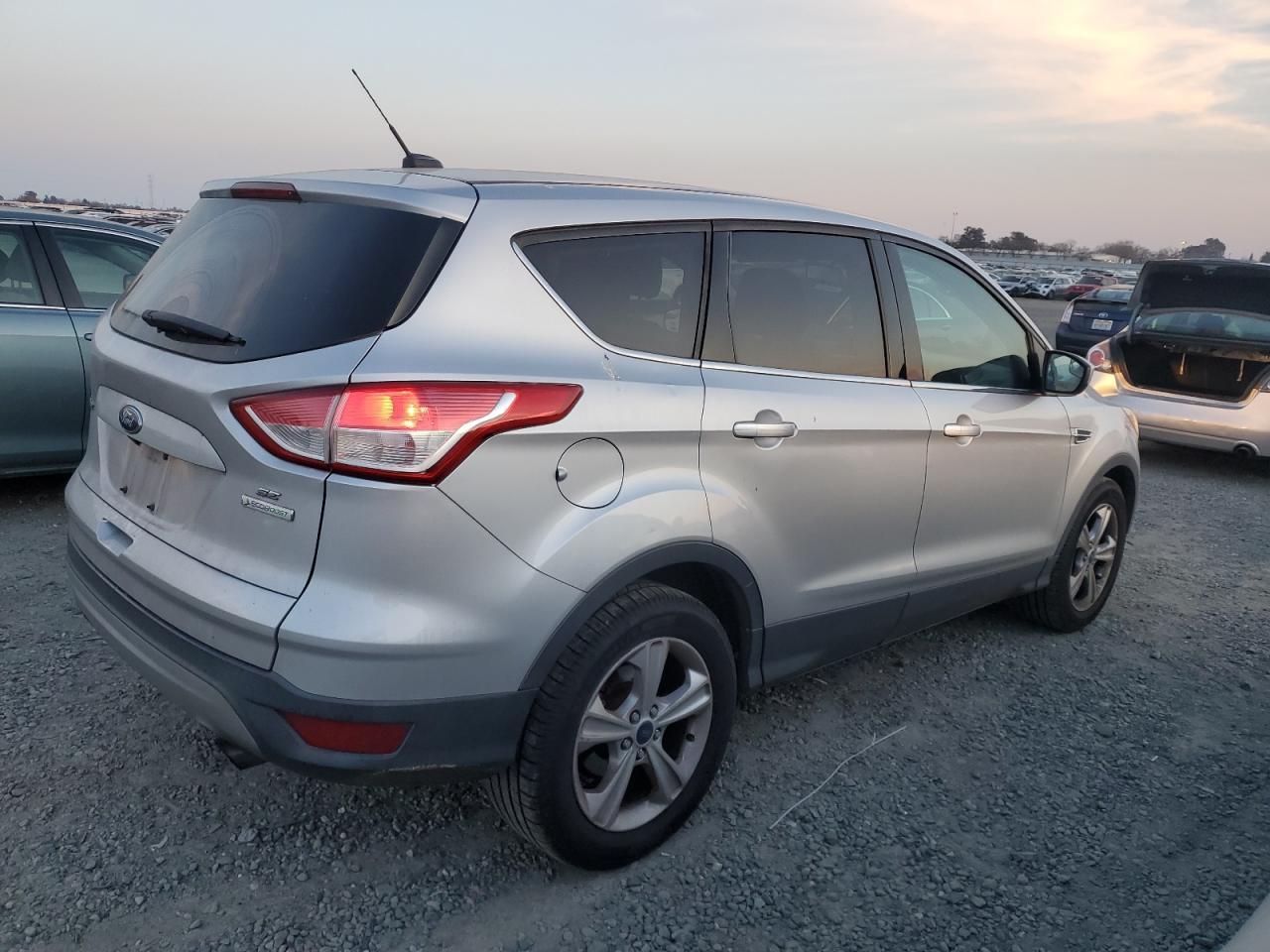 2015 Ford Escape VIN 1FMCU0G94FUA93169 Copart auction photo, side damage thumbnail 3