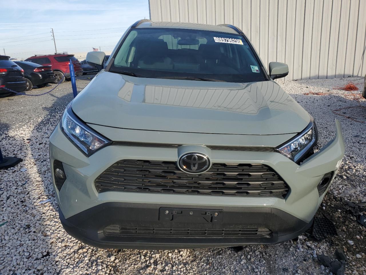 2020 Toyota RAV 4 VIN 2T3P1RFV5LC125824 Copart auction photo, front end / side damage thumbnail 5