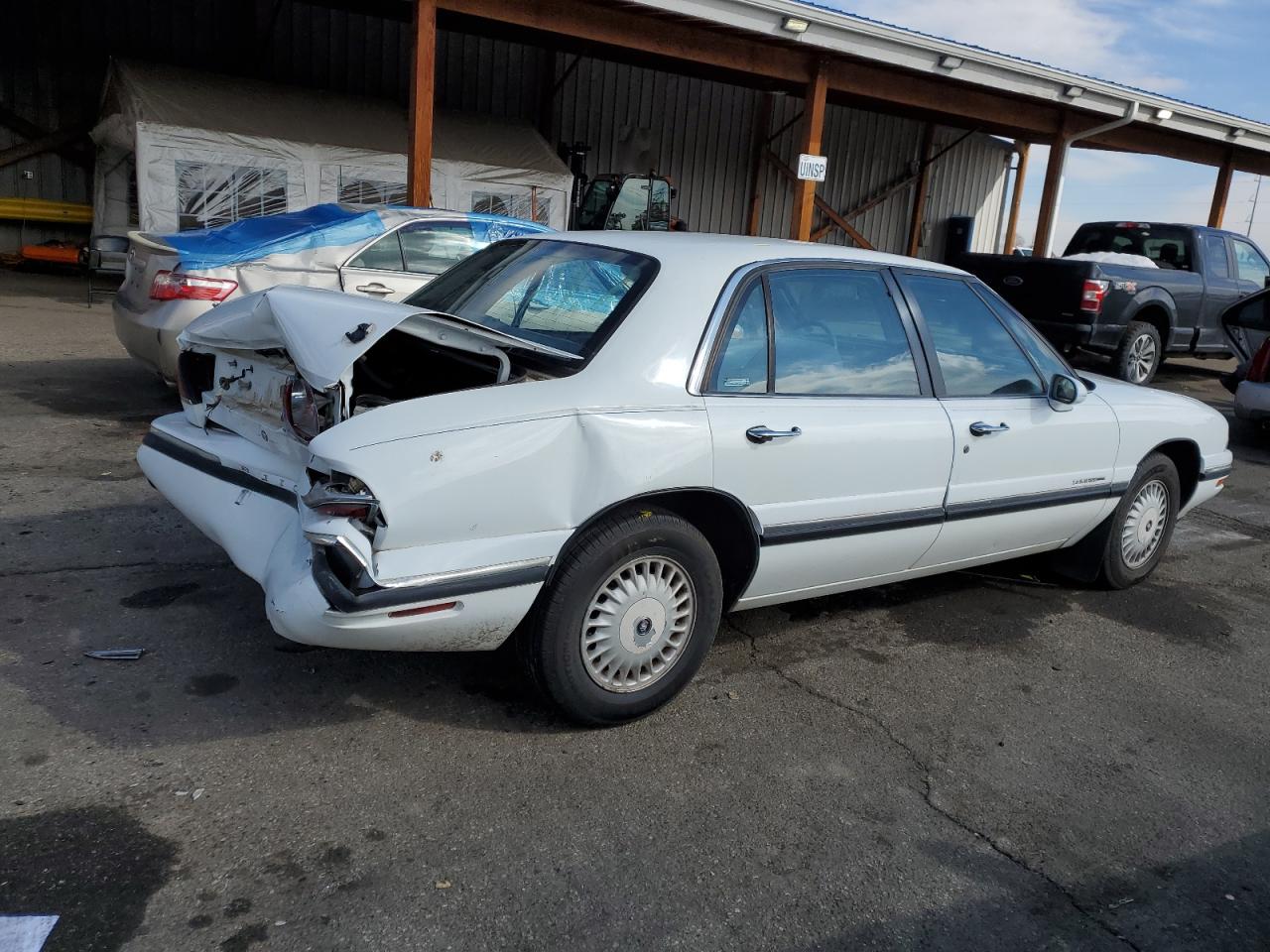 1997 Buick LeSabre VIN 1G4HP52K5VH471981 Copart auction photo, rear end / hail damage thumbnail 3
