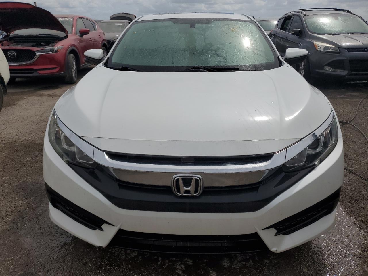 2016 Honda Civic VIN 19XFC2F7XGE050214 Copart auction photo, water/flood damage thumbnail 5