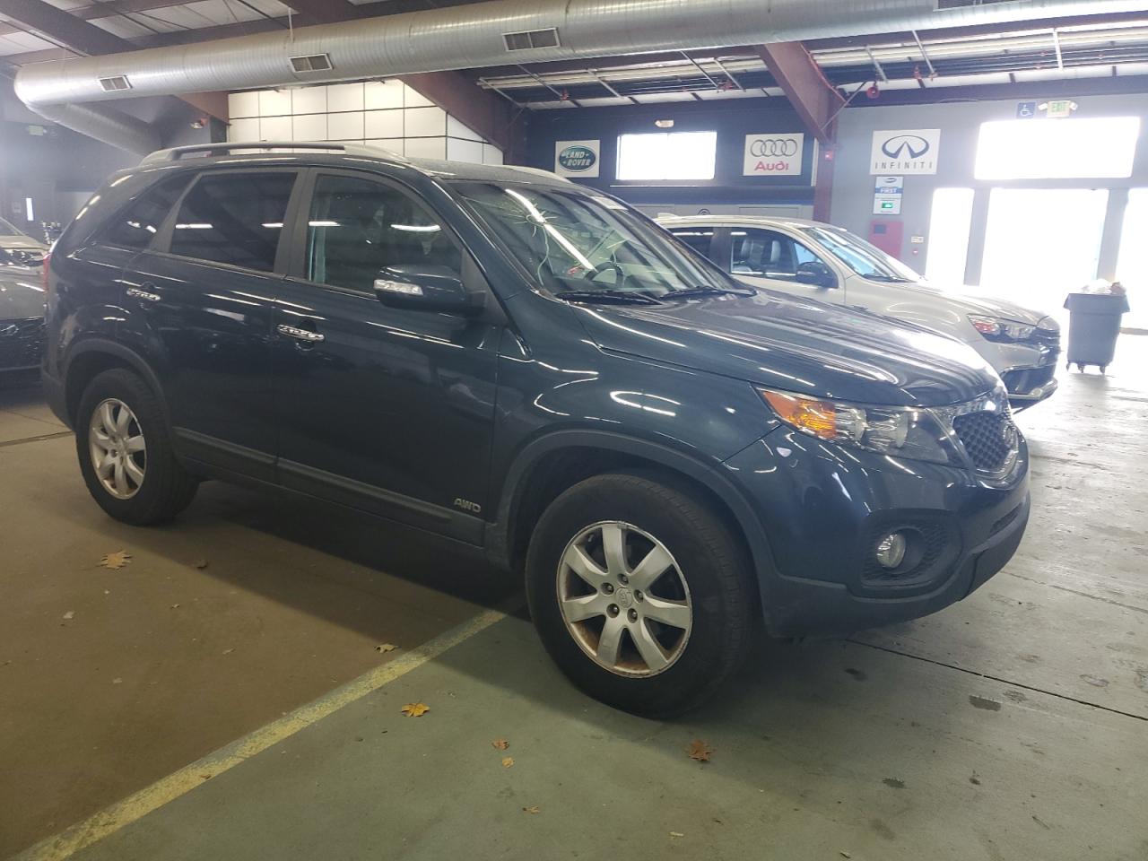 2011 KIA Sorento VIN 5XYKTDA14BG053960 Copart auction photo, minor dent/scratches damage thumbnail 4