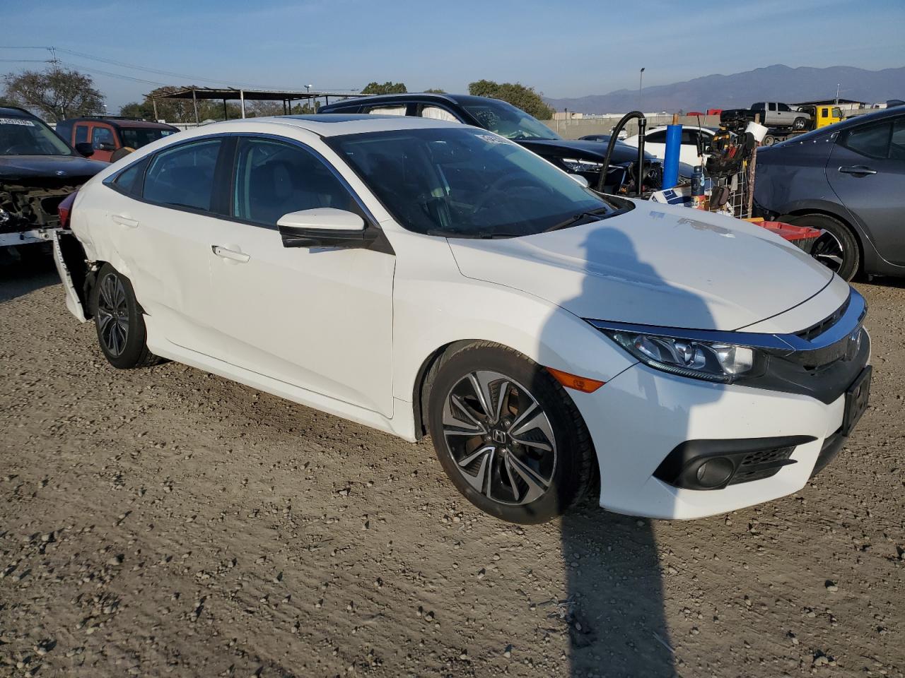 2017 Honda Civic VIN 19XFC1F31HE206942 Copart auction photo, rear end / side damage thumbnail 4