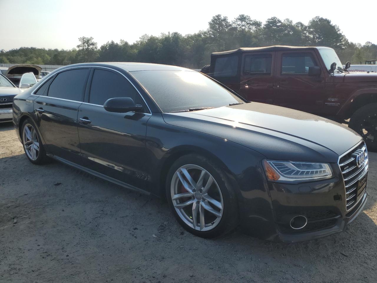 2016 Audi A8 VIN WAU43AFD2GN005588 Copart auction photo, minor dent/scratches damage thumbnail 4