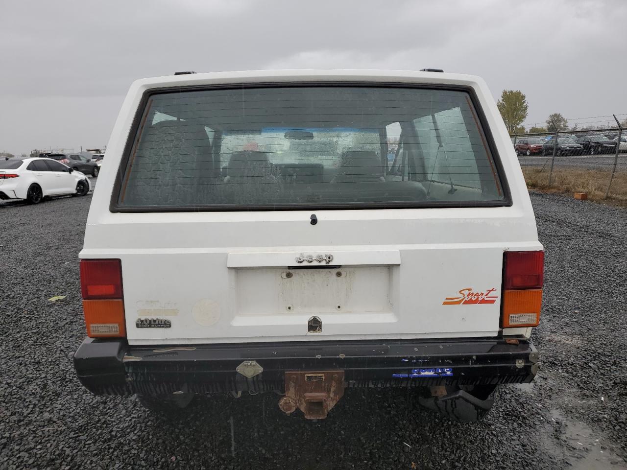 1991 Jeep Grand Cherokee VIN 1J4FJ87S8ML544256 Copart auction photo, side damage thumbnail 6