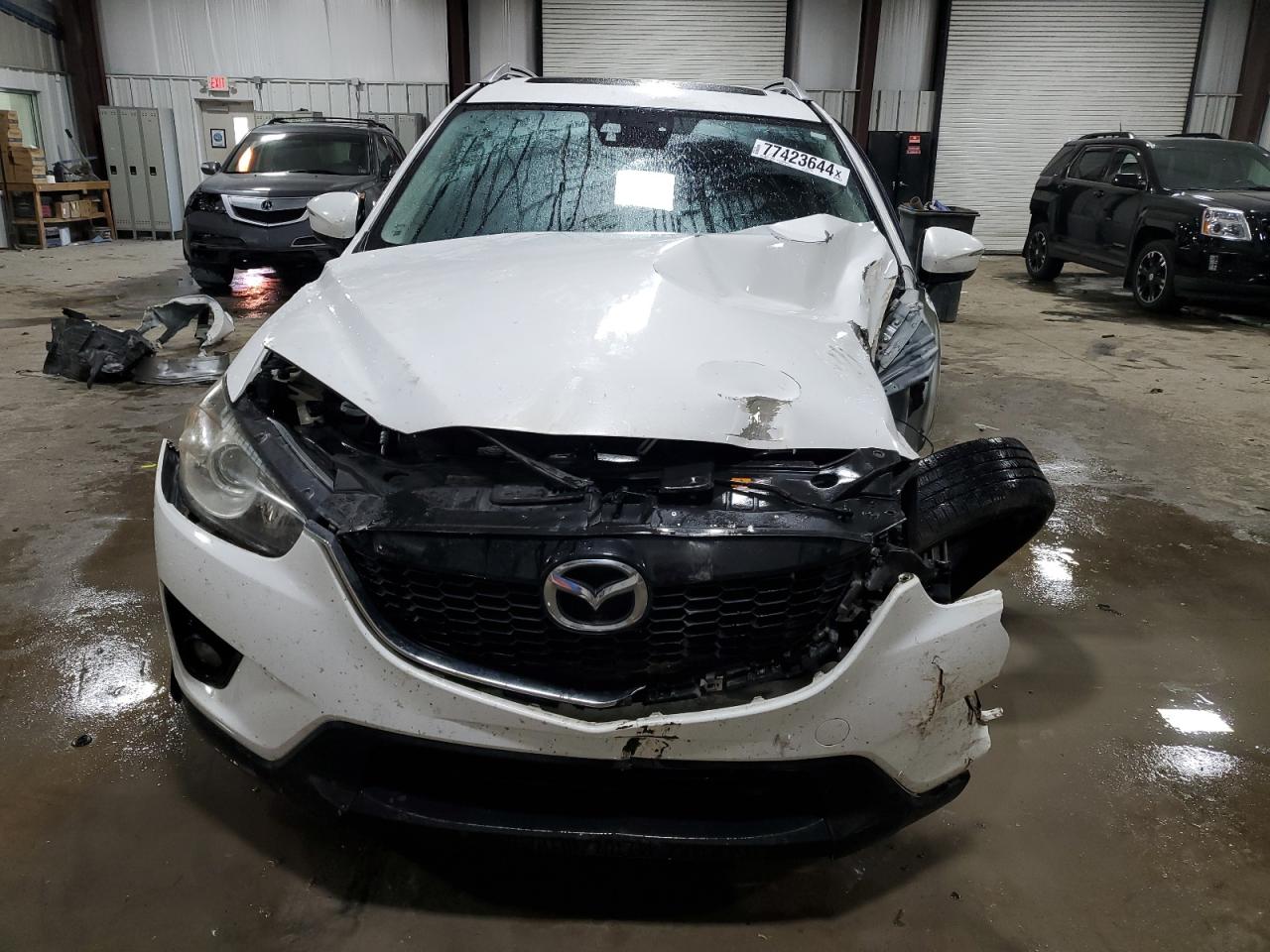 2015 Mazda CX-5 VIN JM3KE4DYXF0552381 Copart auction photo, front end / side damage thumbnail 5