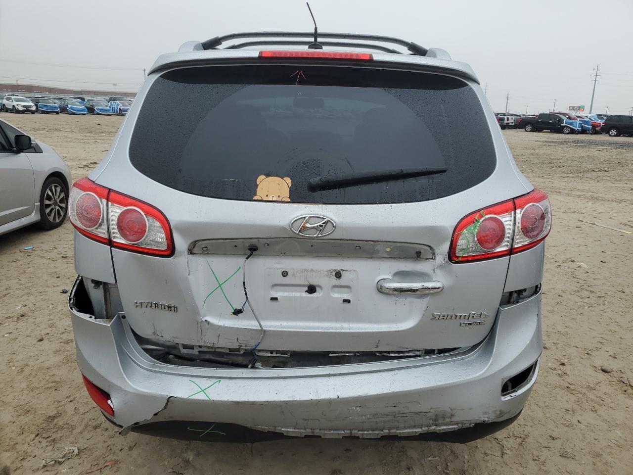 2010 Hyundai Santa Fe VIN 5NMSK4AG3AH402165 Copart auction photo, rear end damage thumbnail 6