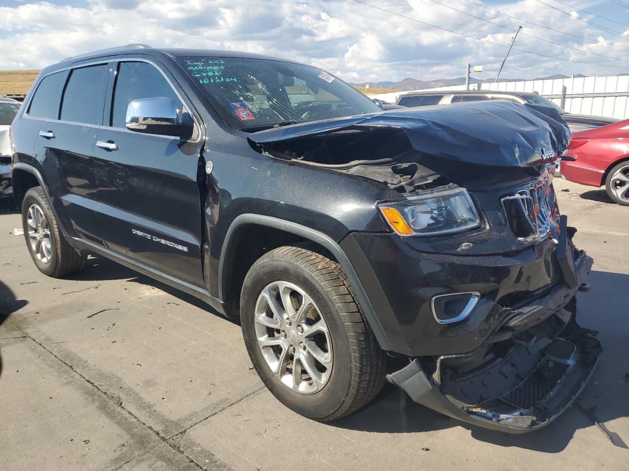 2015 Jeep Grand Cherokee VIN 1C4RJFBG7FC697479 Copart auction photo, front end / hail damage thumbnail 4