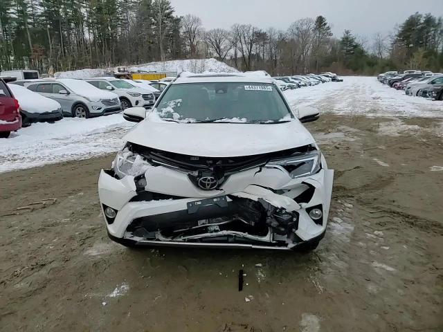 2018 Toyota RAV 4 VIN JTMRFREV9JJ747509 Copart auction photo, front end / minor dent/scratches damage thumbnail 12