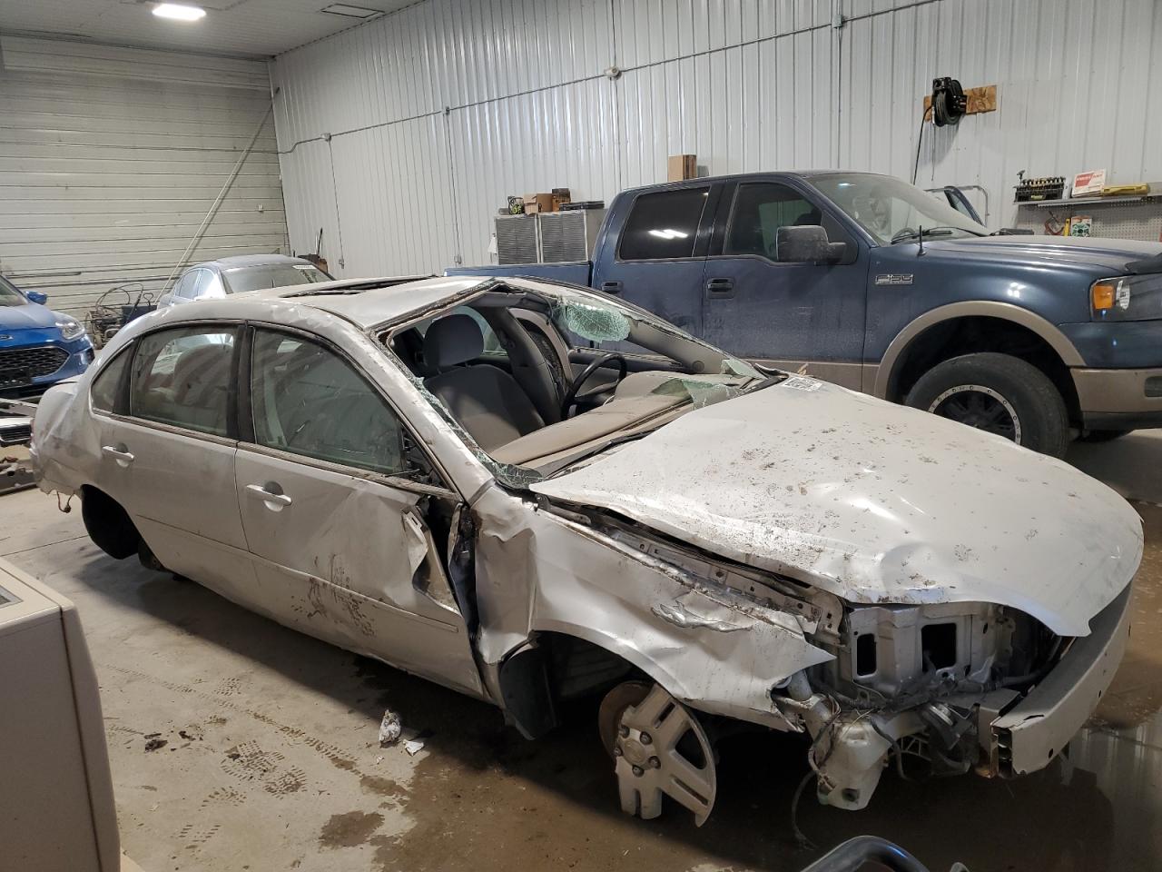 2014 Chevrolet Impala VIN 2G1WB5E32E1161460 Copart auction photo, all over damage thumbnail 4