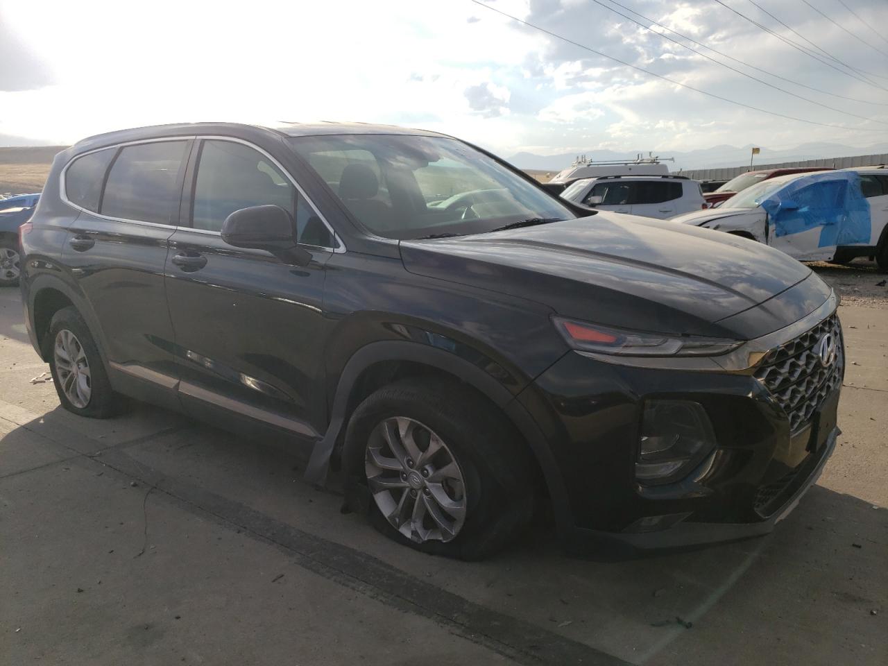 2019 Hyundai Santa Fe VIN 5NMS3CAD5KH049751 Copart auction photo, hail / undercarriage damage thumbnail 4