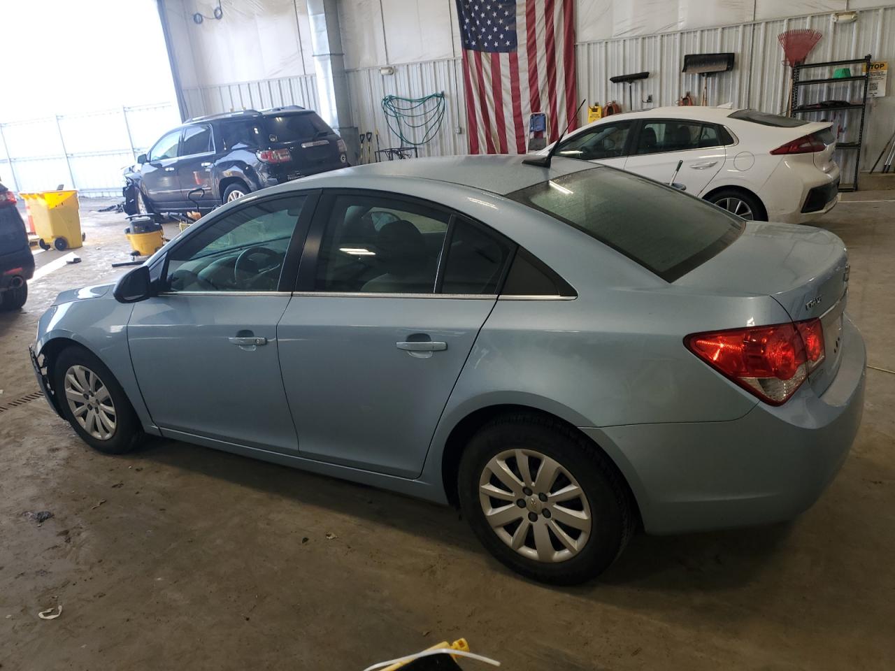 2011 Chevrolet Cruze VIN 1G1PC5SH9B7135440 Copart auction photo, side / front end damage thumbnail 2