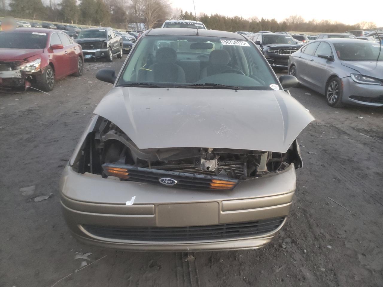 2004 Ford Focus VIN 1FAFP33P94W146499 Copart auction photo, front end / side damage thumbnail 5