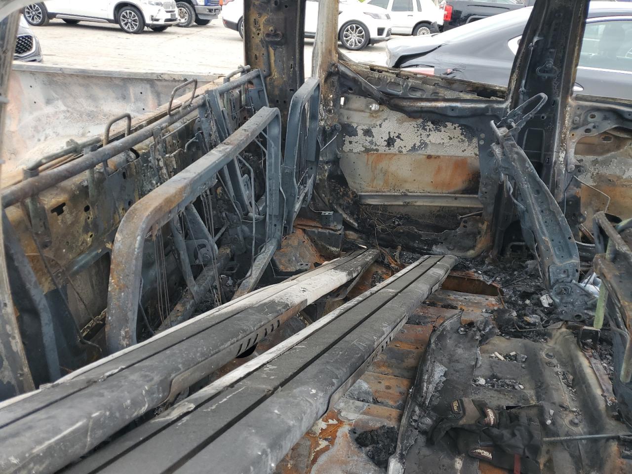 2021 RAM 1500 VIN 1C6SRFFT7MN634859 Copart auction photo, burn damage thumbnail 10