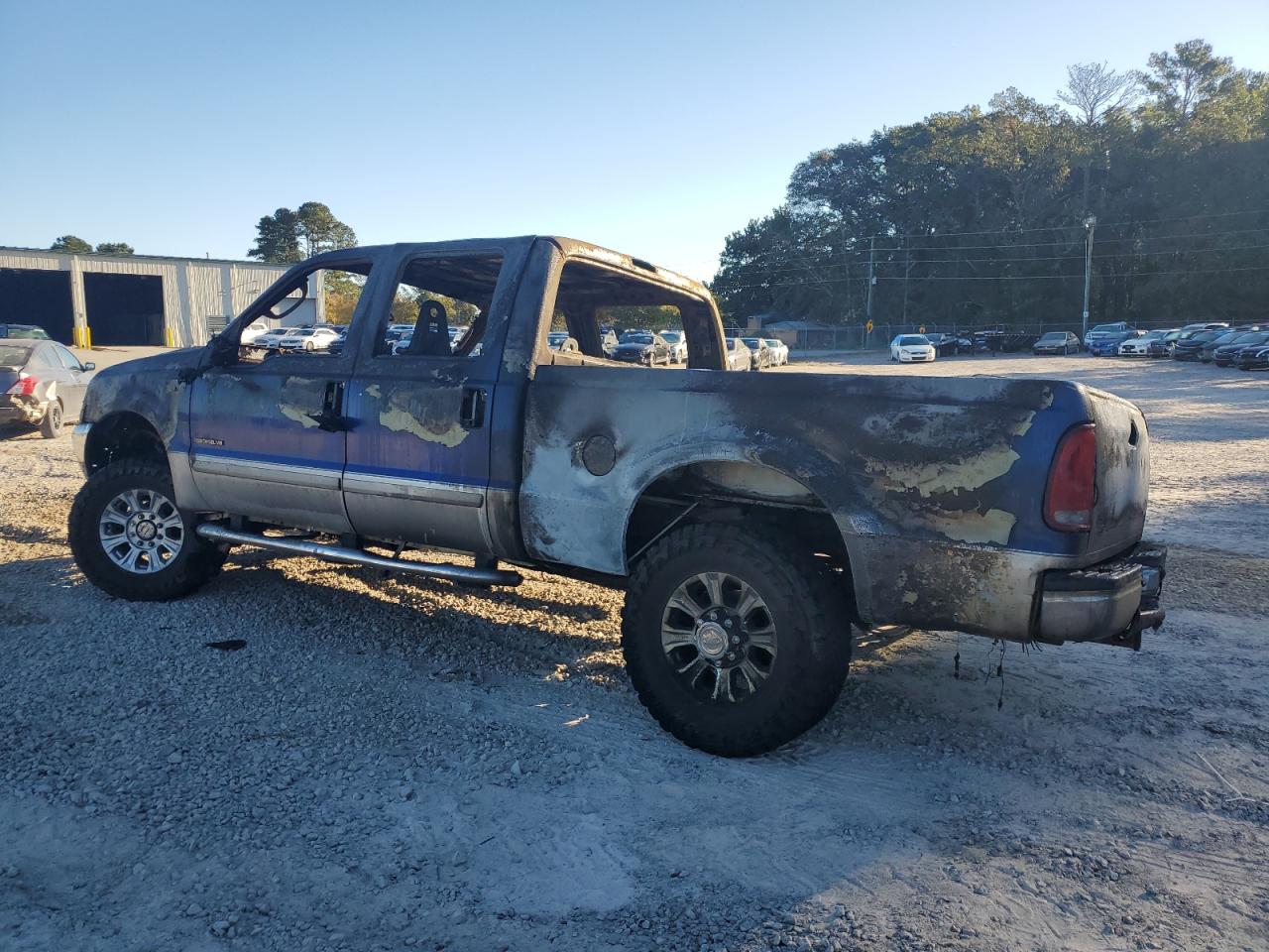 2003 Ford F250 VIN 1FTNW21F53EA11229 Copart auction photo, burn damage thumbnail 2