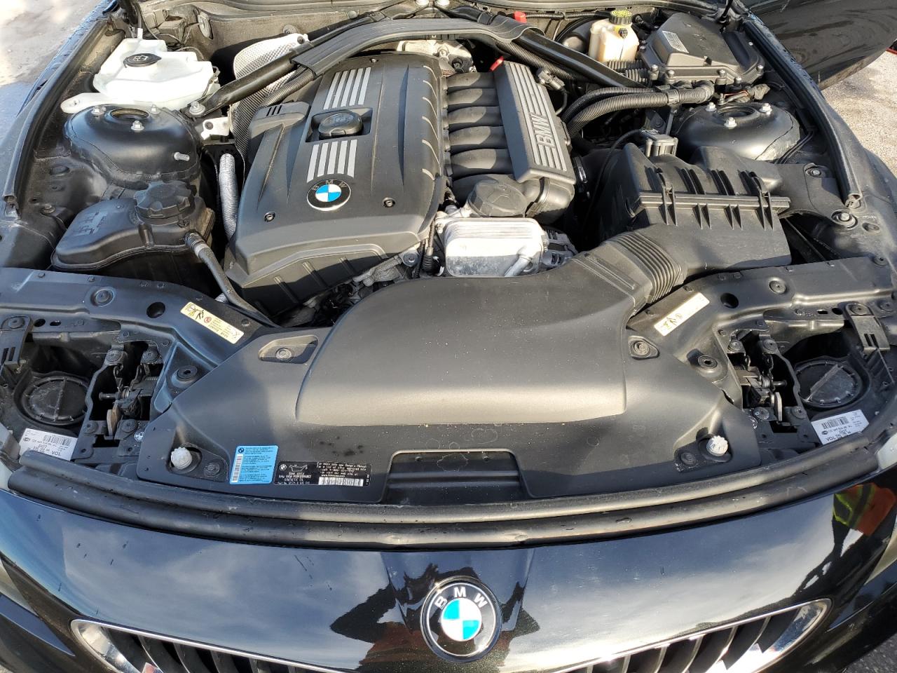 2009 BMW Z4 VIN WBALM53579E161867 Copart auction photo, rear end / side damage thumbnail 11