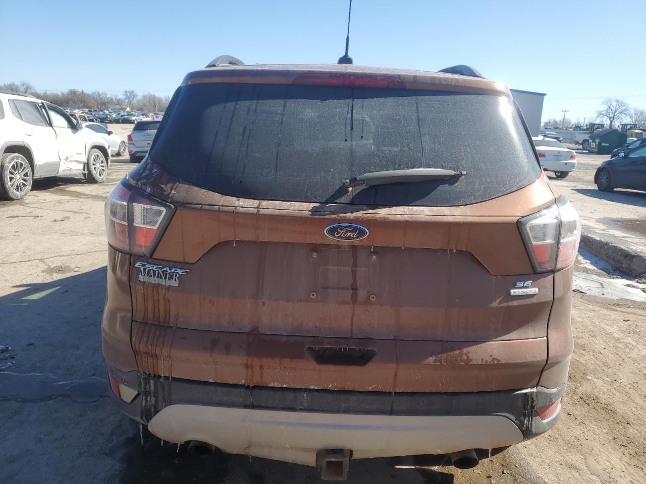2017 Ford Escape VIN 1FMCU0GDXHUB41751 Copart auction photo, rear end / minor dent/scratches damage thumbnail 6