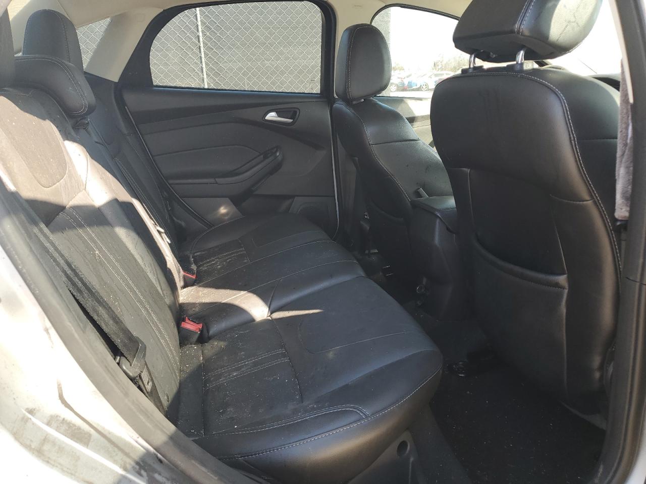2013 Ford Focus VIN 1FADP3F24DL384124 Copart auction photo, all over damage thumbnail 10