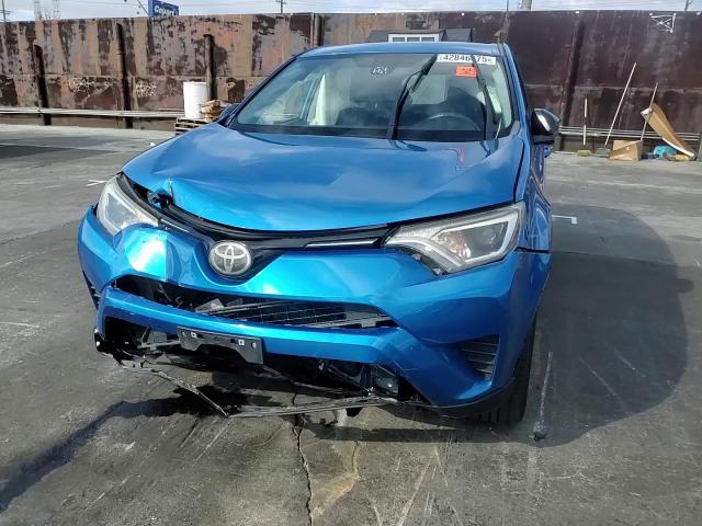2018 Toyota RAV 4 VIN JTMZFREV4JJ724252 Copart auction photo, front end damage thumbnail 11