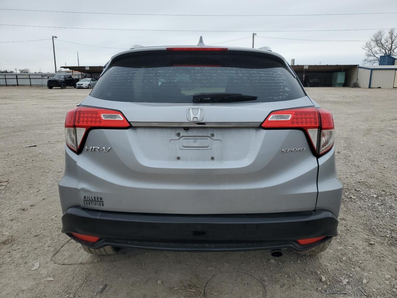 2019 Honda HR-V VIN 3CZRU5H16KG700832 Copart auction photo, side / front end damage thumbnail 6