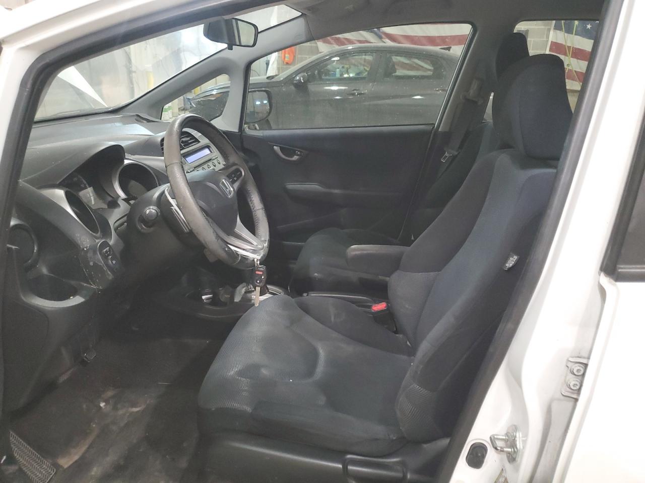 2010 Honda Fit VIN JHMGE8H41AC002652 Copart auction photo, side / rear end damage thumbnail 7