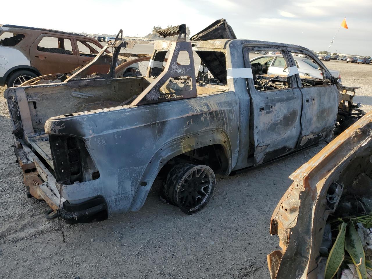 2022 RAM 1500 VIN 1C6SRFU9XNN315867 Copart auction photo, burn damage thumbnail 3