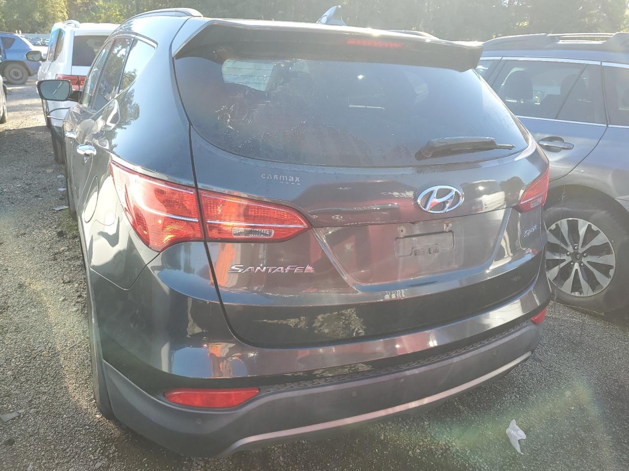 2014 Hyundai Santa Fe VIN 5XYZU3LB5EG148088 Copart auction photo, front end / undercarriage damage thumbnail 6