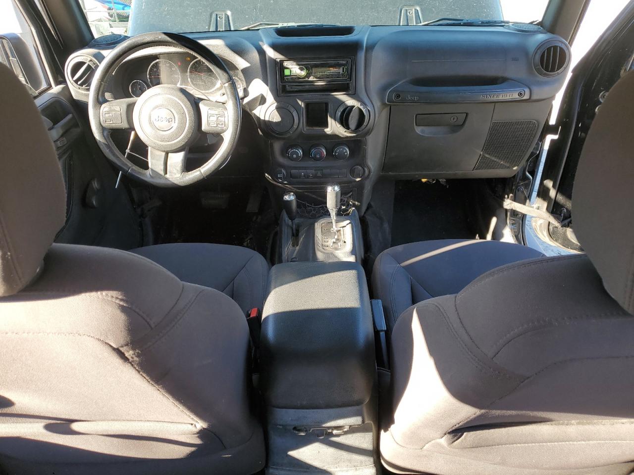2016 Jeep Wrangler VIN 1C4AJWAG4GL323282 Copart auction photo, side damage thumbnail 8