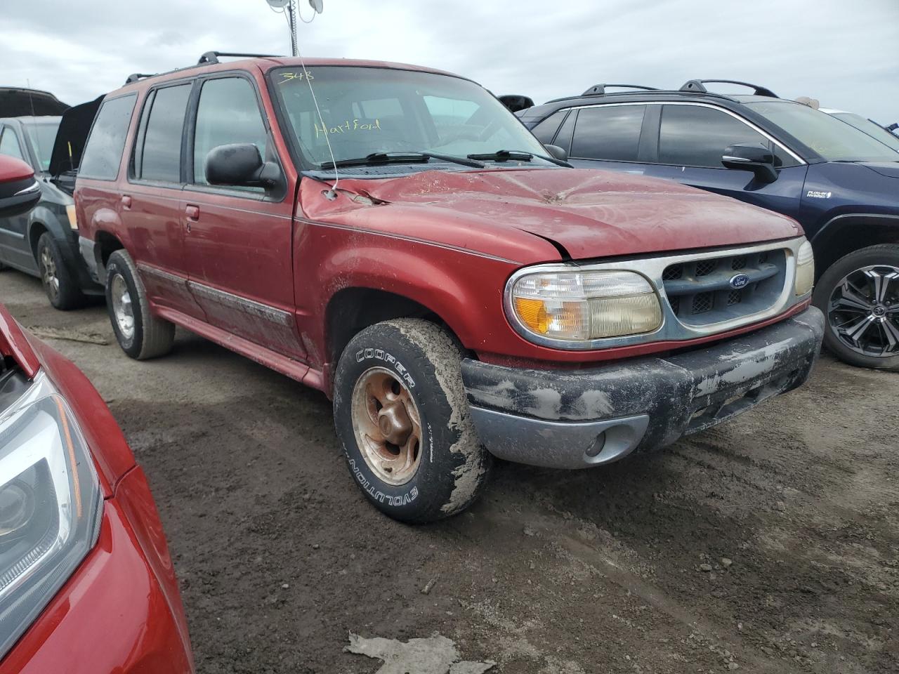 1999 Ford Explorer VIN 1FMZU34E4XUB49867 Copart auction photo, all over damage thumbnail 4