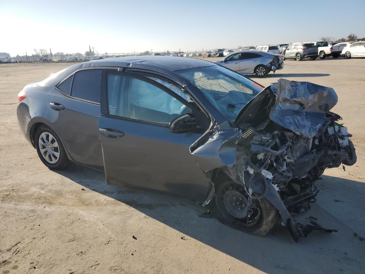 2015 Toyota Corolla VIN 5YFBURHE9FP291310 Copart auction photo, front end / side damage thumbnail 4